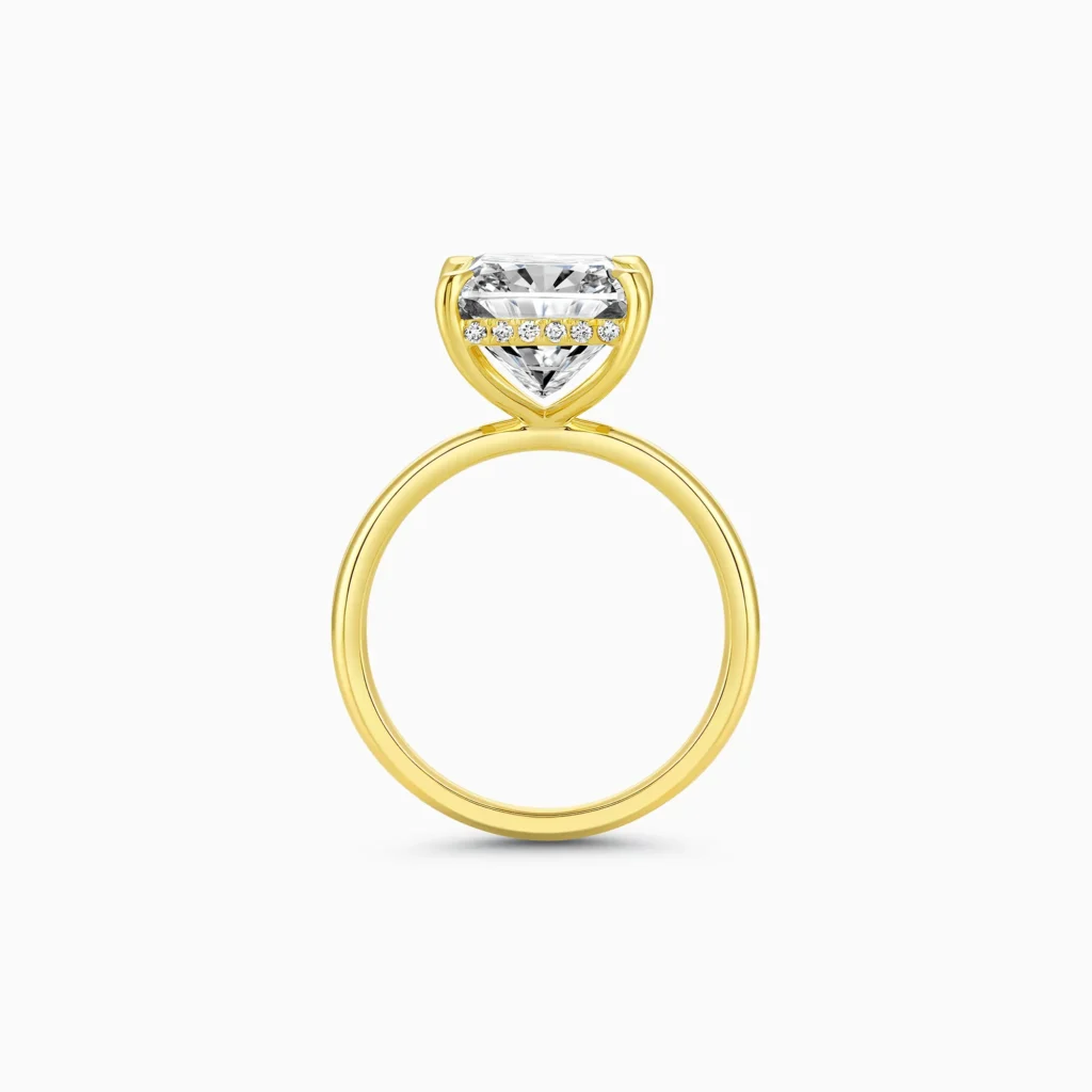 Princess cut solitaire engagement ring in yellow gold